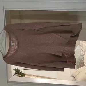 Sweater frayed edges and swing flare bottom.